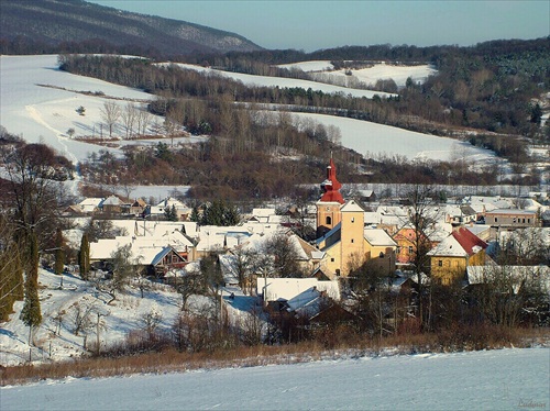 Zasnežená krajina.